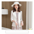 Two Western Style Business Suits And Dresses