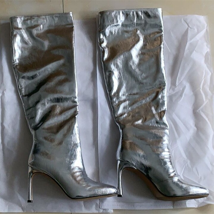 processing time:7-15 days after placing orders--Women's Autumn and Winter New Fashion Metal Decorated High Heel Boots Warm Short Fluffy High Round Head Boots.