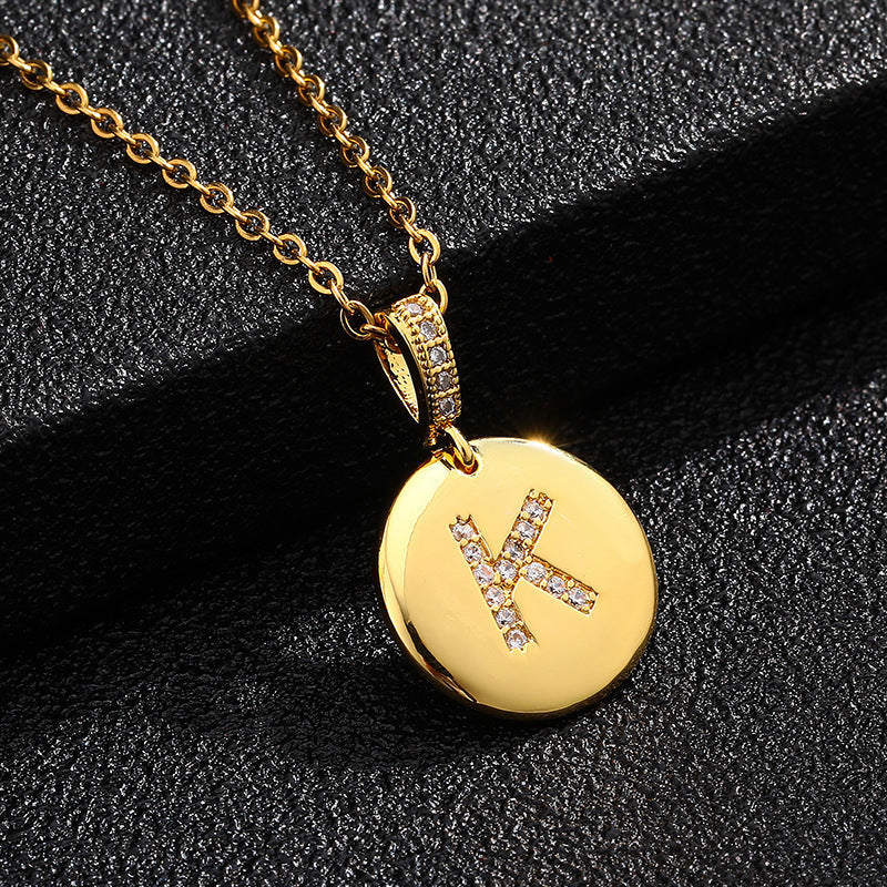 Zircon Initial Disc Necklace Collection