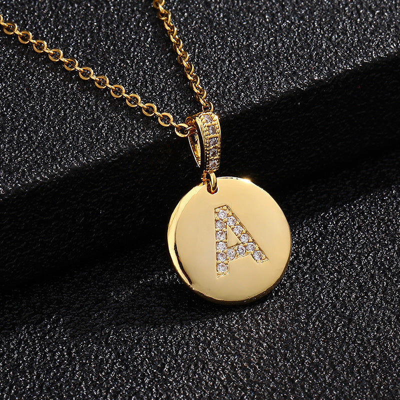 Zircon Initial Disc Necklace Collection