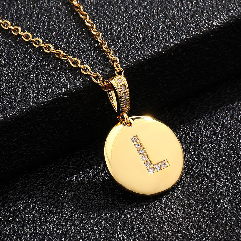 Zircon Initial Disc Necklace Collection