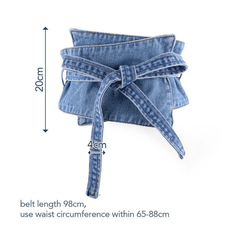 The Denim Peplum Cinch Belt — Dark Wash