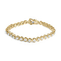 .925 Sterling Silver 1/10 Cttw Diamond Open Circle Beaded Wheel Link Tennis Bracelet (I-J Color, I3 Clarity) - 7.25"