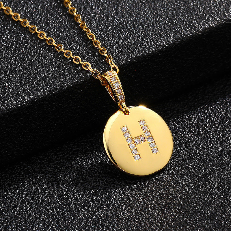 Zircon Initial Disc Necklace Collection