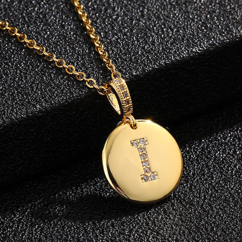 Zircon Initial Disc Necklace Collection