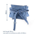 The Denim Peplum Cinch Belt — Dark Wash