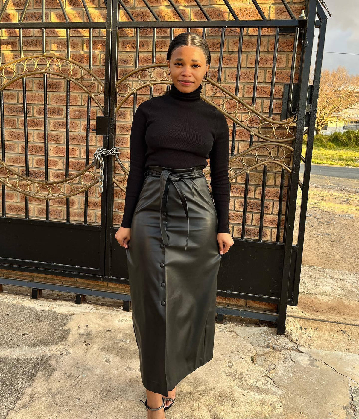 The Buckle Slit Leather Skirt — Black