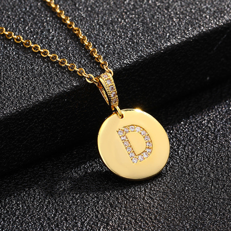 Zircon Initial Disc Necklace Collection