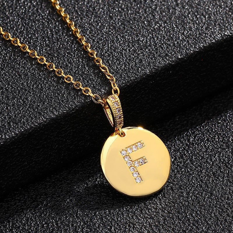 Zircon Initial Disc Necklace Collection