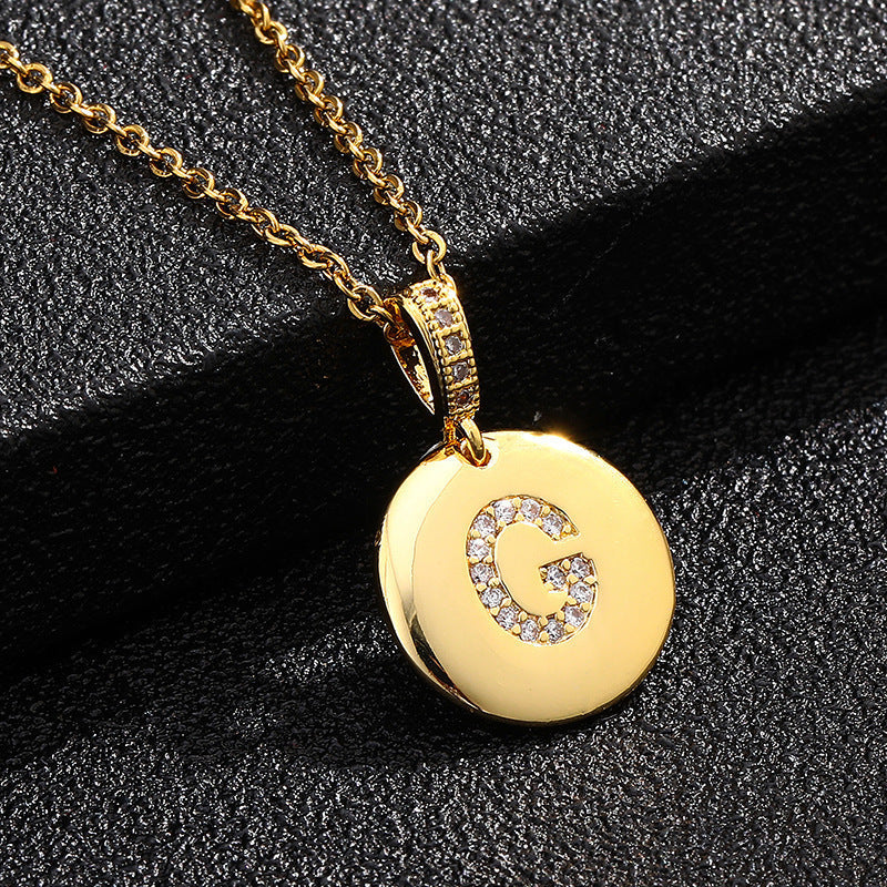 Zircon Initial Disc Necklace Collection