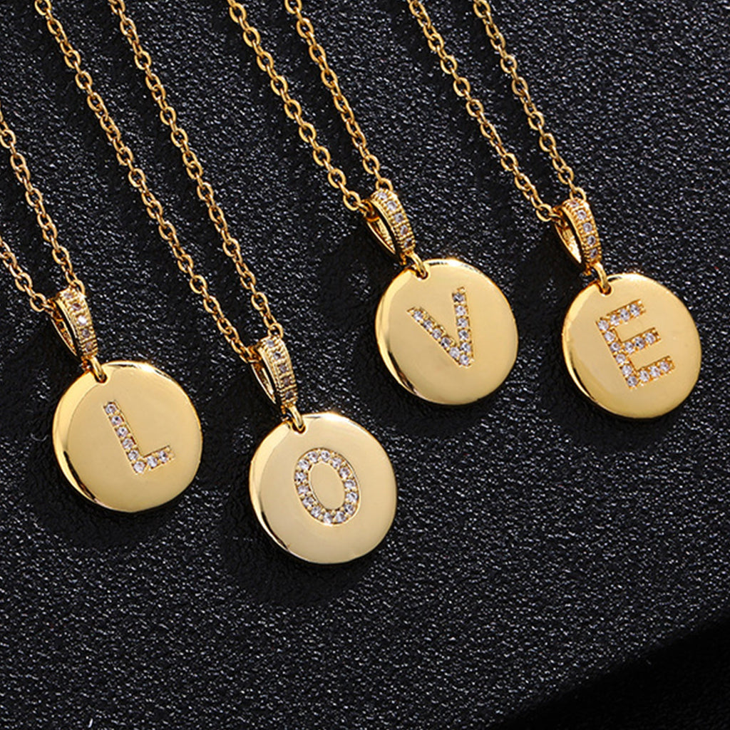 Zircon Initial Disc Necklace Collection