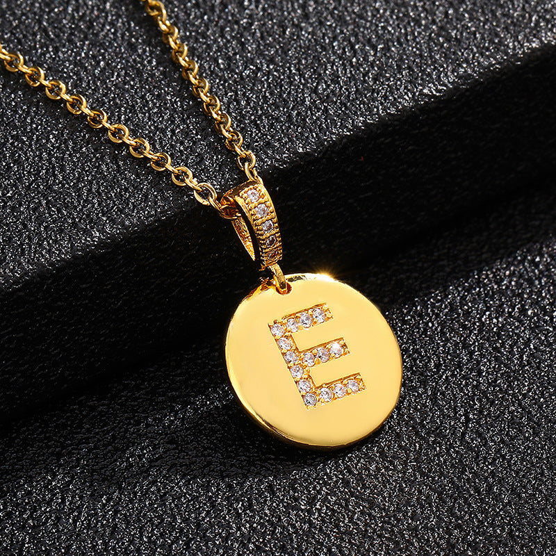 Zircon Initial Disc Necklace Collection