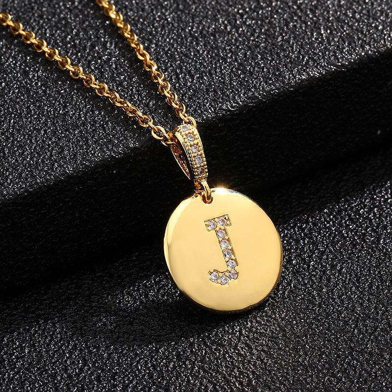 Zircon Initial Disc Necklace Collection