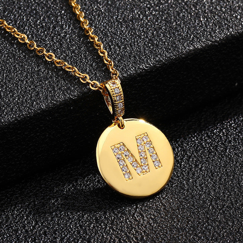 Zircon Initial Disc Necklace Collection